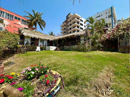 Emiliano Zapata House | Cabaña del Jardín PV Zona Romántica