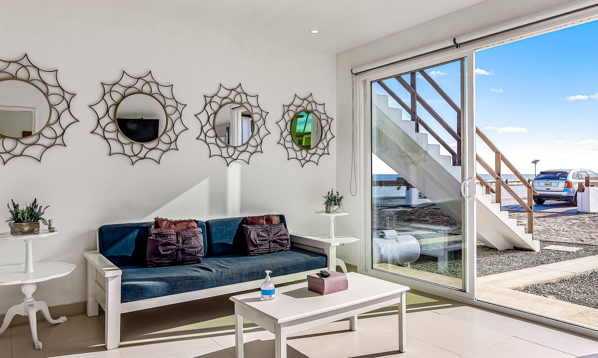 La Paloma House | Dog-friendly oceanfront villa with rooftop patio, pool access, & kitchen