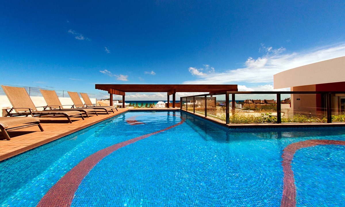 Zazil-ha Apartment | Luxury condo with modern kitchenette, fast WiFi, AC & pool - near the beach