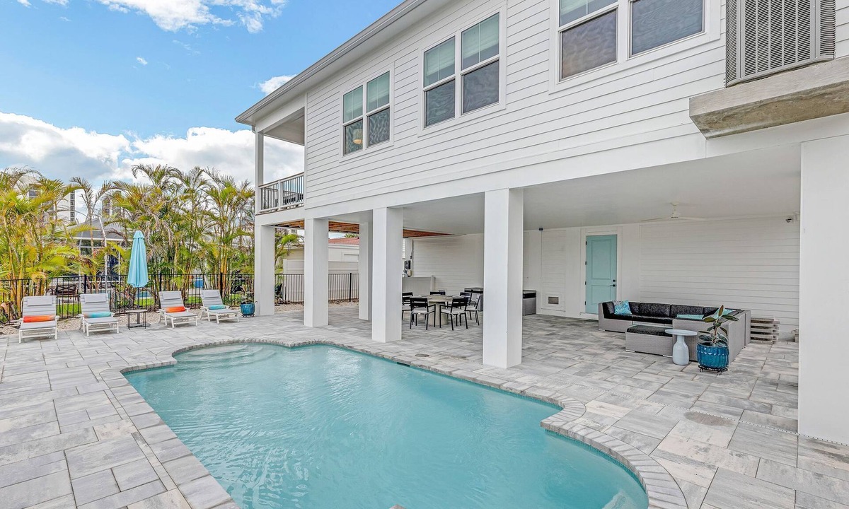 South Island House | NEW Build Modern Beach Beauty on Canal with Heated Pool 150 yds to beach Access