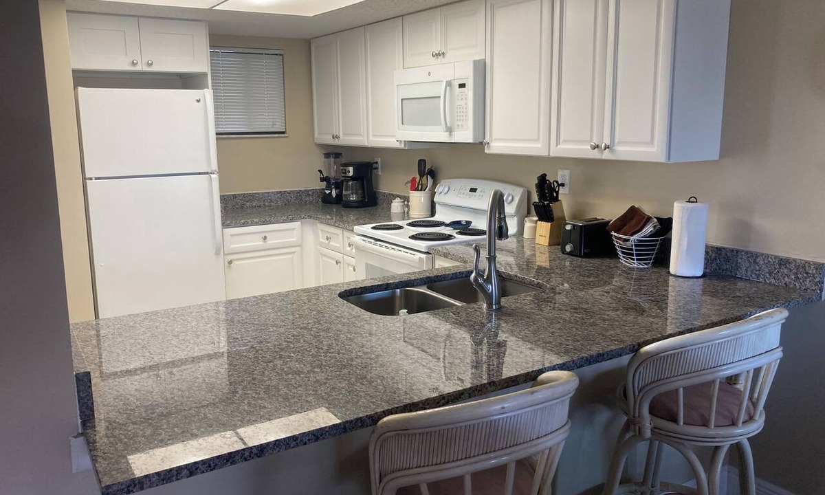 Butler Beach Condo | Ocean Village Club K33 with ocean and pool views. New kitchen and flooring.