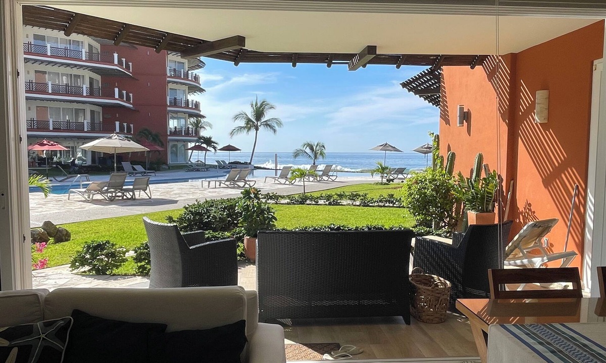 Bajos de Chila Condo | Walk out to pool and ocean steps away.