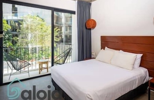 Tulum City Center Hostel | 207 - Suite with balcony and rooftop pool