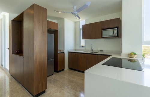 Miramar Apartment | Beachfront apartment with private balcony, heated pool & stunning views