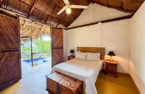 Emiliano Zapata House | Cabaña del Jardín PV Zona Romántica