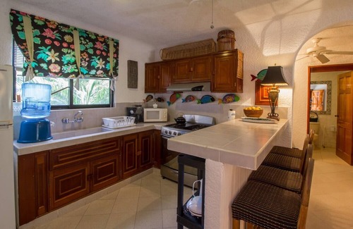 Akumal Condo | Enjoy the ambience of this beachfront condo located in South Akumal!