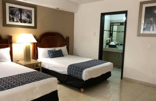 Zona Dorada Hotel | HOTEL ZONA DORADA SUITES