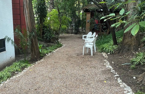 Puebla Villa | House among trees.