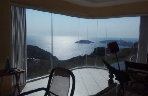Playa Guitarron Condo | Immerse in the Majesty of Nature and Behold From the Heights Acapulco Bay