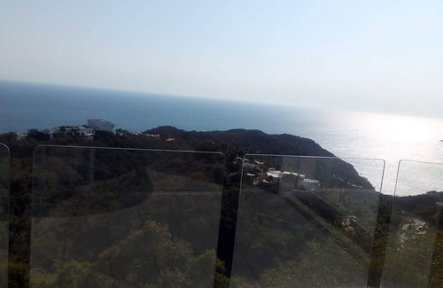 Playa Guitarron Condo | Immerse in the Majesty of Nature and Behold From the Heights Acapulco Bay
