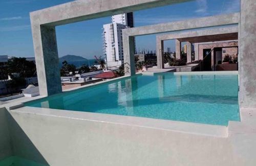 Ferrocarrilera Apartment | Impecable loft, terraza, alberca, cerca de playa