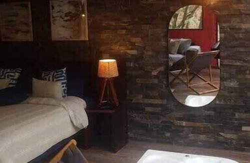 Zapopan Apartment | NEW! Romantic Forest Loft with Hot Tub, Deck & BBQ