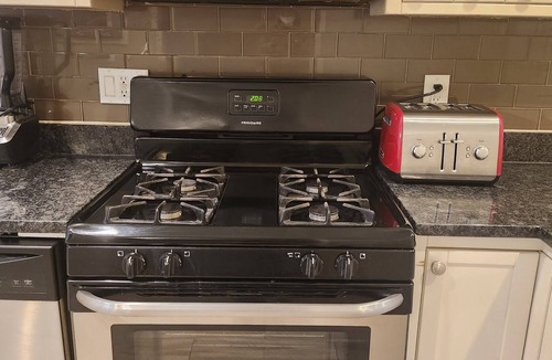 West Baltimore House | 2-bedroom townhome in superb Baltimore with parking and gated yard