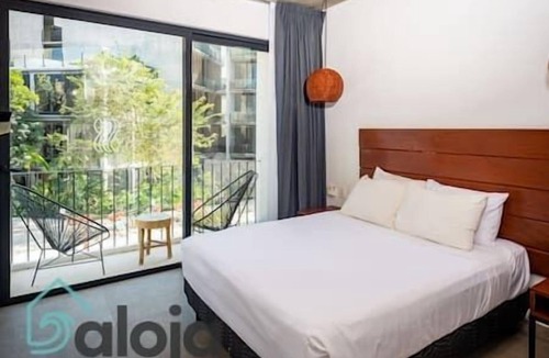 Tulum City Center Hostel | 207 - Suite with balcony and rooftop pool