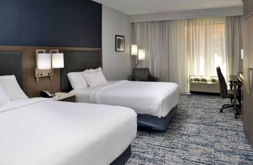 Downtown Wilmington Hotel | 3 Units | 2 Queen Beds | Steps from Riverwalk, Shops, and Local Dining