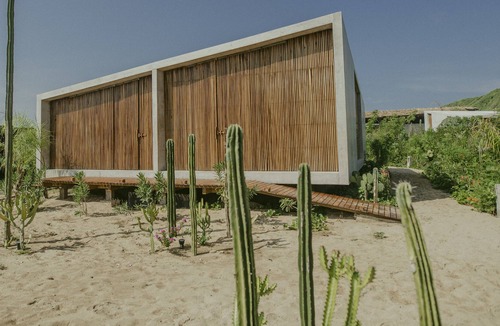 Puerto Escondido House | A sophisticated atmosphere on a virgin beach.