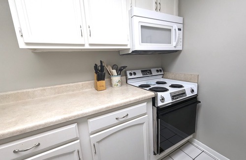 Avon By The Sea Condo | Affordable ONE BR Main Floor Condo RIGHT ON THE BEACH w/KING Bed & Heated POOL!
