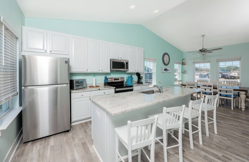 Captain's Cove House | Anchor's Away | Captain's Cove Waterfront w/Pool & Golf, Pet Friendly + First-Floor Suite