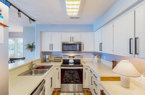 North Shore Condo | Another Tequila Sunrise - Lakefront condo w/breathtaking views & wheelchair accessibility