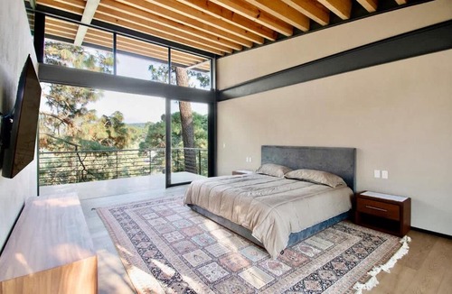 Valle de Bravo House | Architectural glass masterpiece villa in Avandaro Forest
