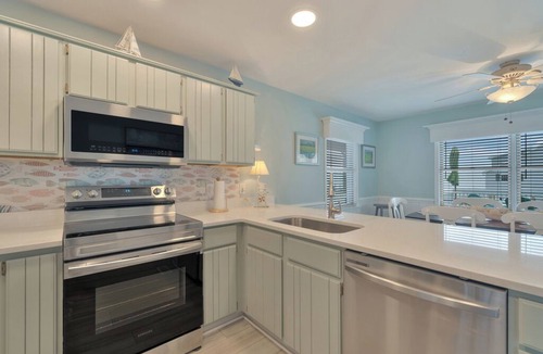 Captain's Cove House | Bay Breeze by Seaside Vacations & Sales