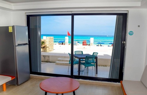 Punta Cancun Apartment | Beach front Villa, great location, steps from the beach!