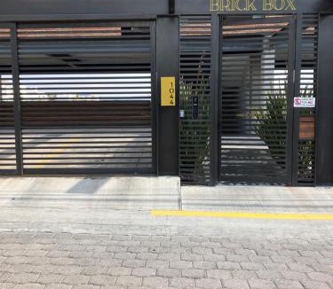 Queretaro Apartment | Brick Box Studio con Terraza