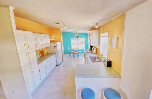 Indian Harbor Estates House | Canal Front Escape with Boat Dock!