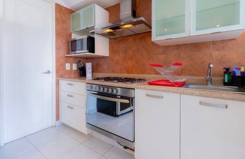 El Yaqui Condo | Capitalia - GYM - Garden - Parking
