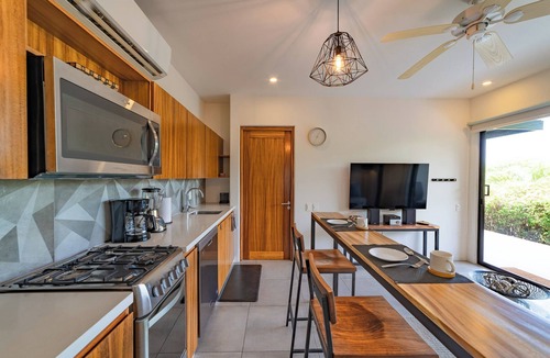 P Chahue Condo | Chic Central Living: 1-Bedroom Condo Rental in Prime Location