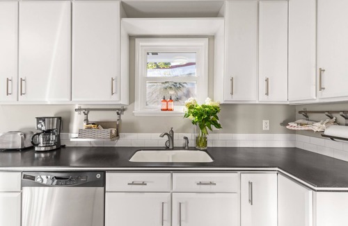 Haller Lake House | Dog-Friendly Home with a Hot Tub and Amazing Backyard