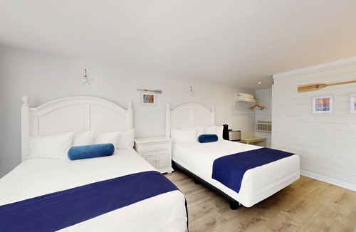 Lower Township Hotel | Double Queen Room for a Cozy Group Stay