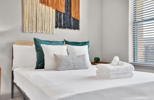Loring Heights Apartment | Ebony & Ivory Midtown King Bed