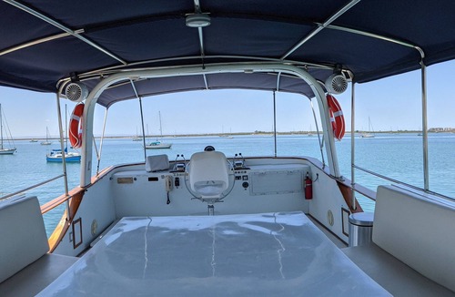 La Paz Boat Rental | "El Don" is a 65ft Classic Hatteras luxury yacht docked in La Paz, Mexico.