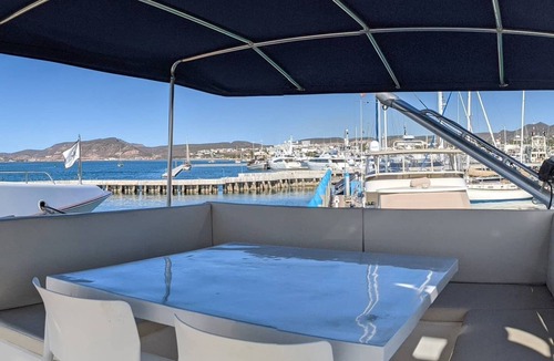 La Paz Boat Rental | "El Don" is a 65ft Classic Hatteras luxury yacht docked in La Paz, Mexico.