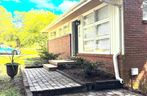 Cary House | Fabulous 3-bedroom MidMod Cottage in charming downtown Cary.