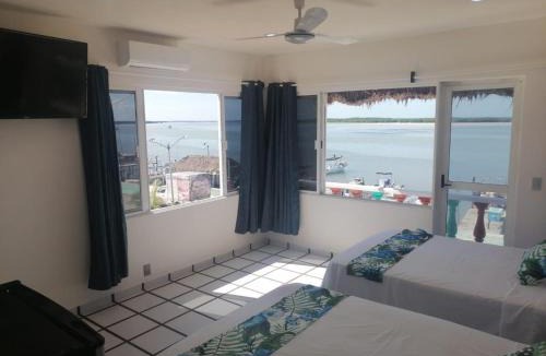 Rio Lagartos Hotel | Hotel y Restaurante Macumba