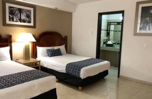 Zona Dorada Hotel | HOTEL ZONA DORADA SUITES
