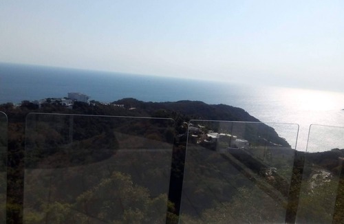 Playa Guitarron Condo | Immerse in the Majesty of Nature and Behold From the Heights Acapulco Bay