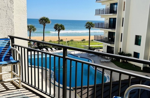 Sunny Shores Condo | Indies House Sought After Beachfront Condo w Pool near shopping and restaurants