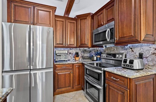 Jupiter Farms House | Jupiter Gem- Heated Pool and Outdoor Oasis w/Kitchen