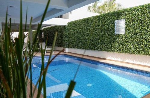Downtown Mazatlan Apartment | King Bed Retreat Parking Ideal Workspace
