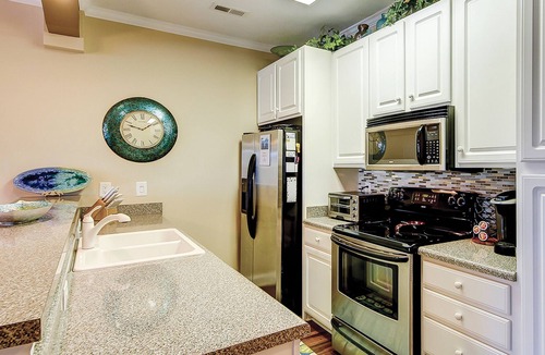 Carolina Yacht Landing Condo | Lakefront, second-floor condo in gated community with balcony, pool & hot tub