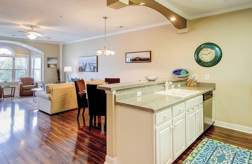 Carolina Yacht Landing Condo | Lakefront, second-floor condo in gated community with balcony, pool & hot tub