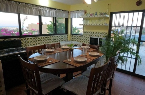 Mauricio Castro House | Large house on a hill with a spectacular view over the sea and mountains