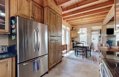 Highlands House | Luxe home overlooking Blue Valley & a stream with elevator & designer interior