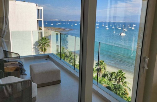 La Cruz de Huanacaxtle Condo | Luxurious beachfront penthouse! Panoramic views, white sand beach, private pool