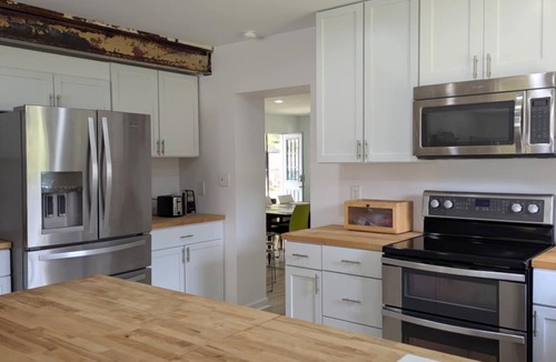 Colonial Beach House | Modern comfort. Bring your boat, walk to the beach. Dog friendly.