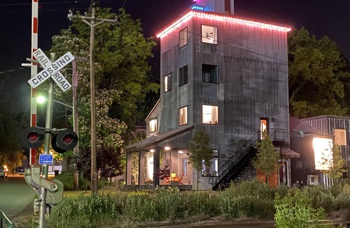 Warwick Apartment | Modern penthouse suite in a restored grain tower with private roof deck.