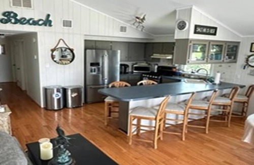 Ship Bottom House | Pet Friendly. Lagoon front. Bay views. Docks. Kayaks. Private yard. Beach.